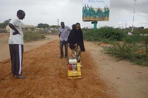 A-woman-using-compression-machine---Do-Nou-project-Iftin---Garisssa-County