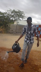 CORE-Kenya-Engineer-watering-newly-completed-road